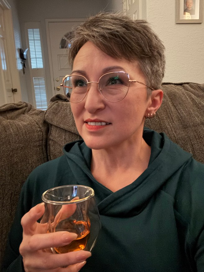 Woman wearing rose gold framed glasses 